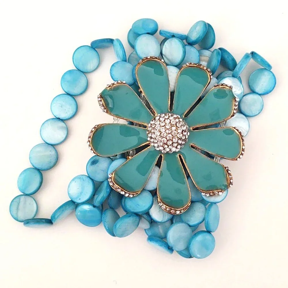 Dyed shell stretch bracelet w/enamel flower& cz's